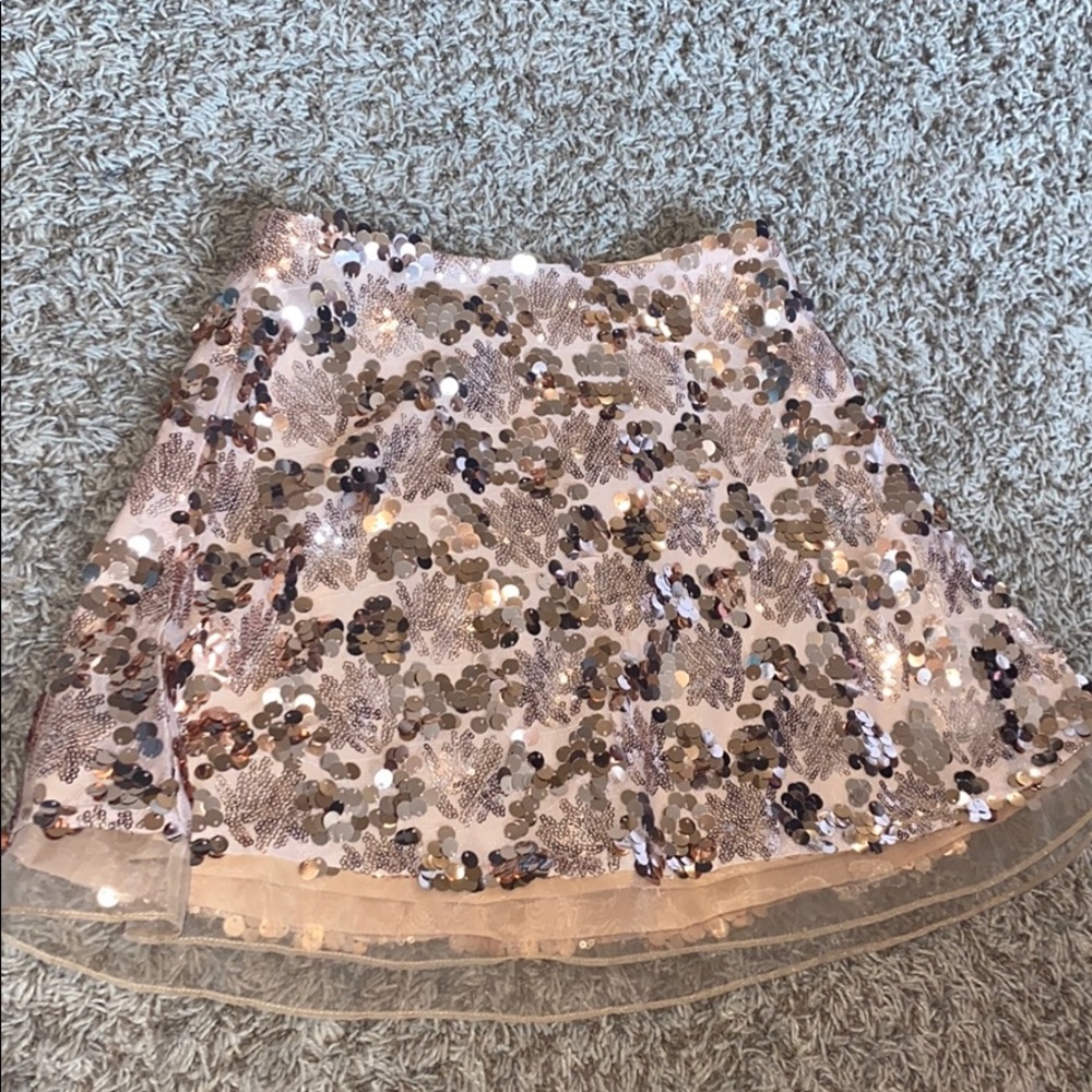 Showpo rose gold sequence mini skirt.